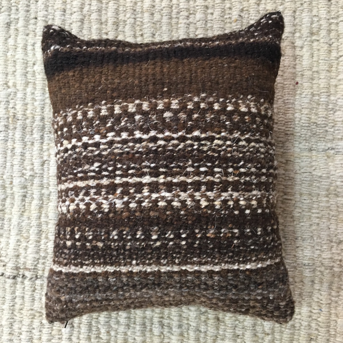 Dark brown pillow