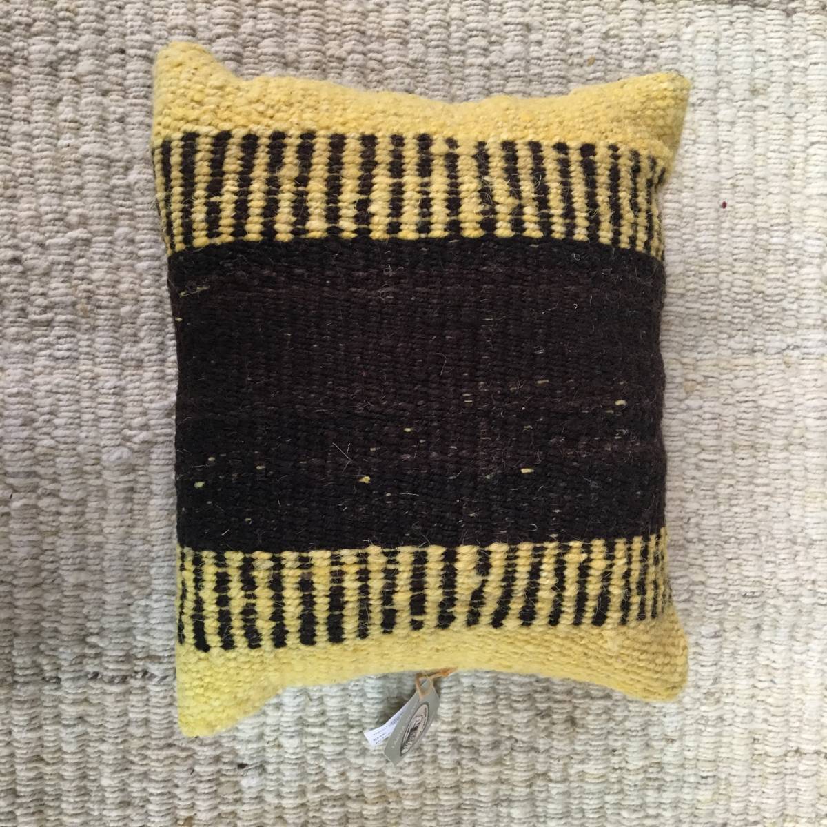 Yellow and brown pillow